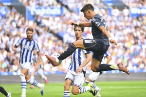 Real Madrid Soar to La Liga Summit Despite Red Card, Powered by Mbappe and Guler Goals