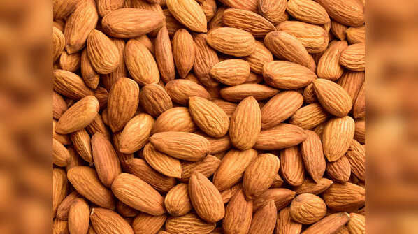 Close-up of almonds with their brown skin
