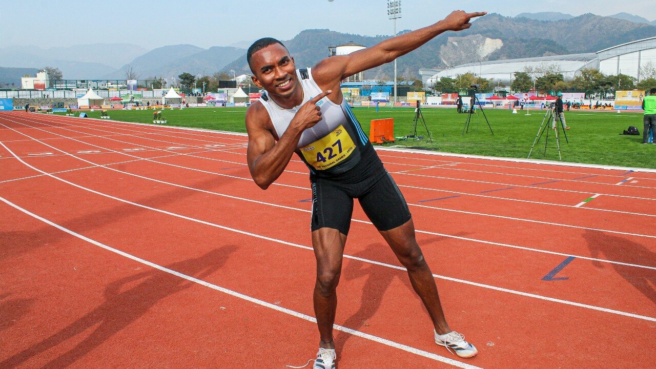 Animesh Kujur celebrating his record-breaking 100m run in Greece.