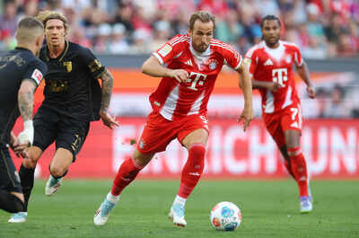 Harry Kane stars as Bayern Munic hold on in thrilling 3-2 win over Augsburg